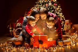 Children opening Christmas gifts